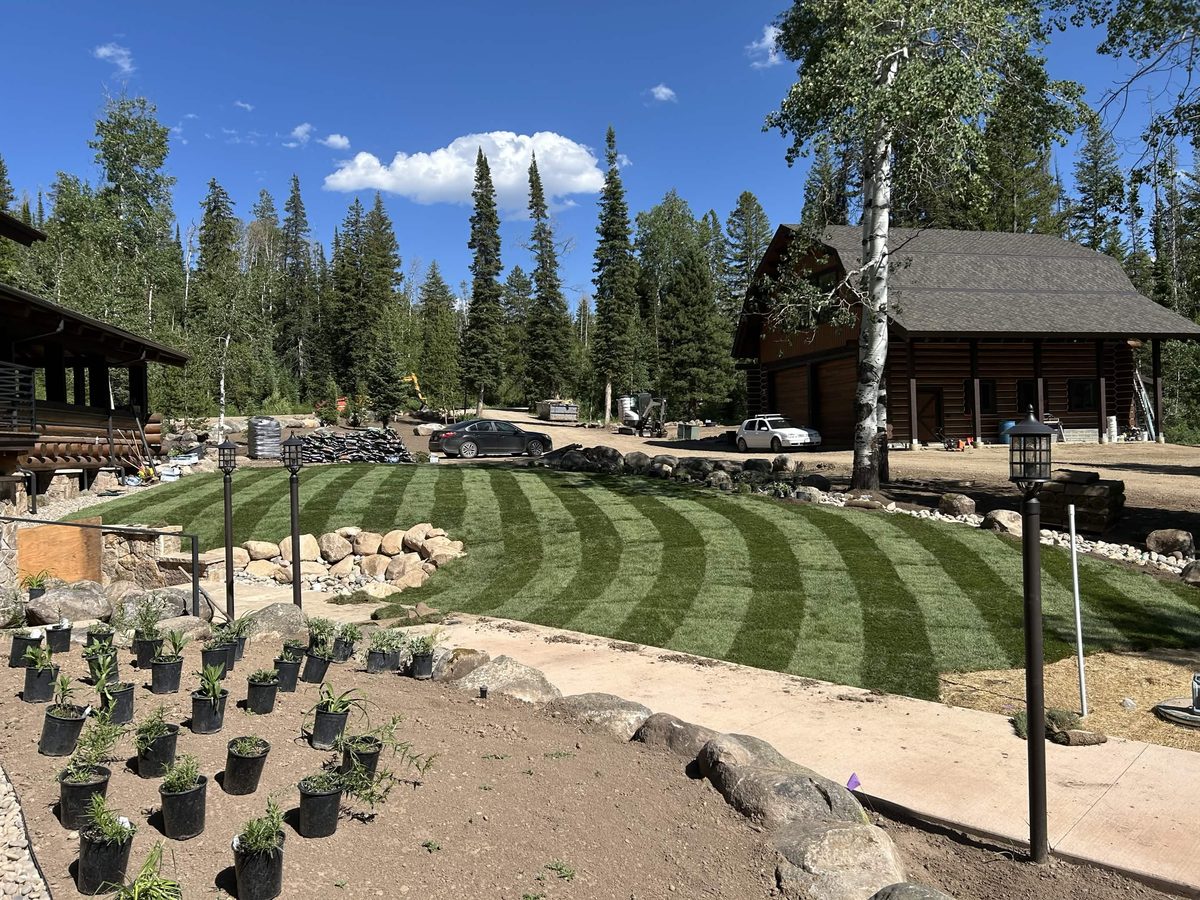 Mountain lodge estate with wave mowing stripes