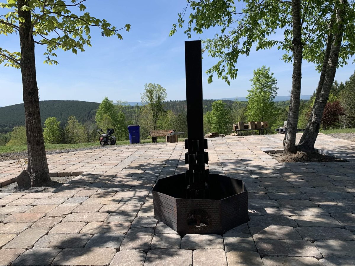 Massive paver patio with custom fire pit